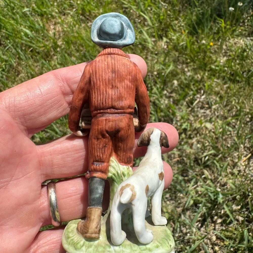 Norman Rockwell Puppy Love Figurine of Boy with Puppies